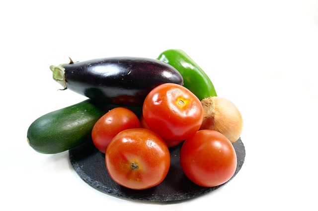 A plate of tomatoes and other vegetables used to make Ratatouille.