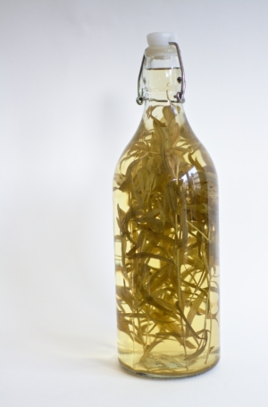 A bottle of taragon infused vivegar.