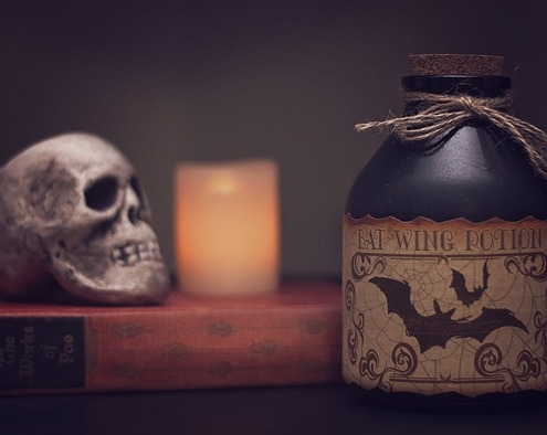 Skull, candle and jug of bat potion. Halloween Crafts.