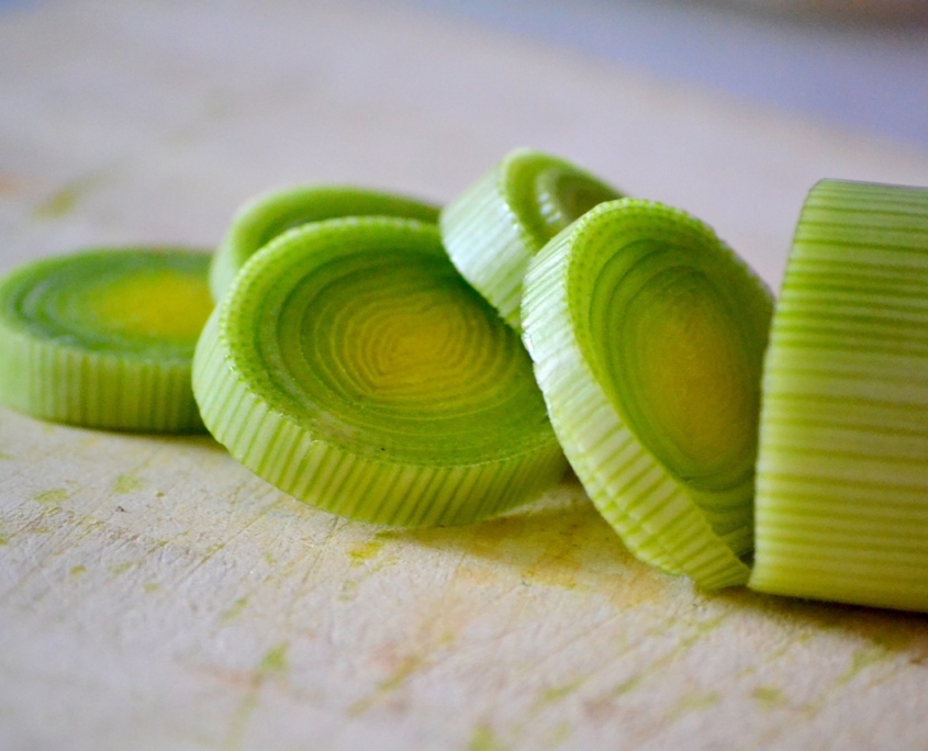 A close-up photo of sliced leeks.