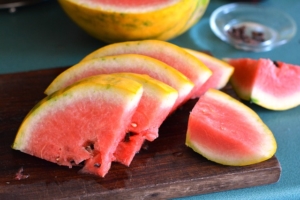 Photo of a sliced Golden Midget Watermelon.